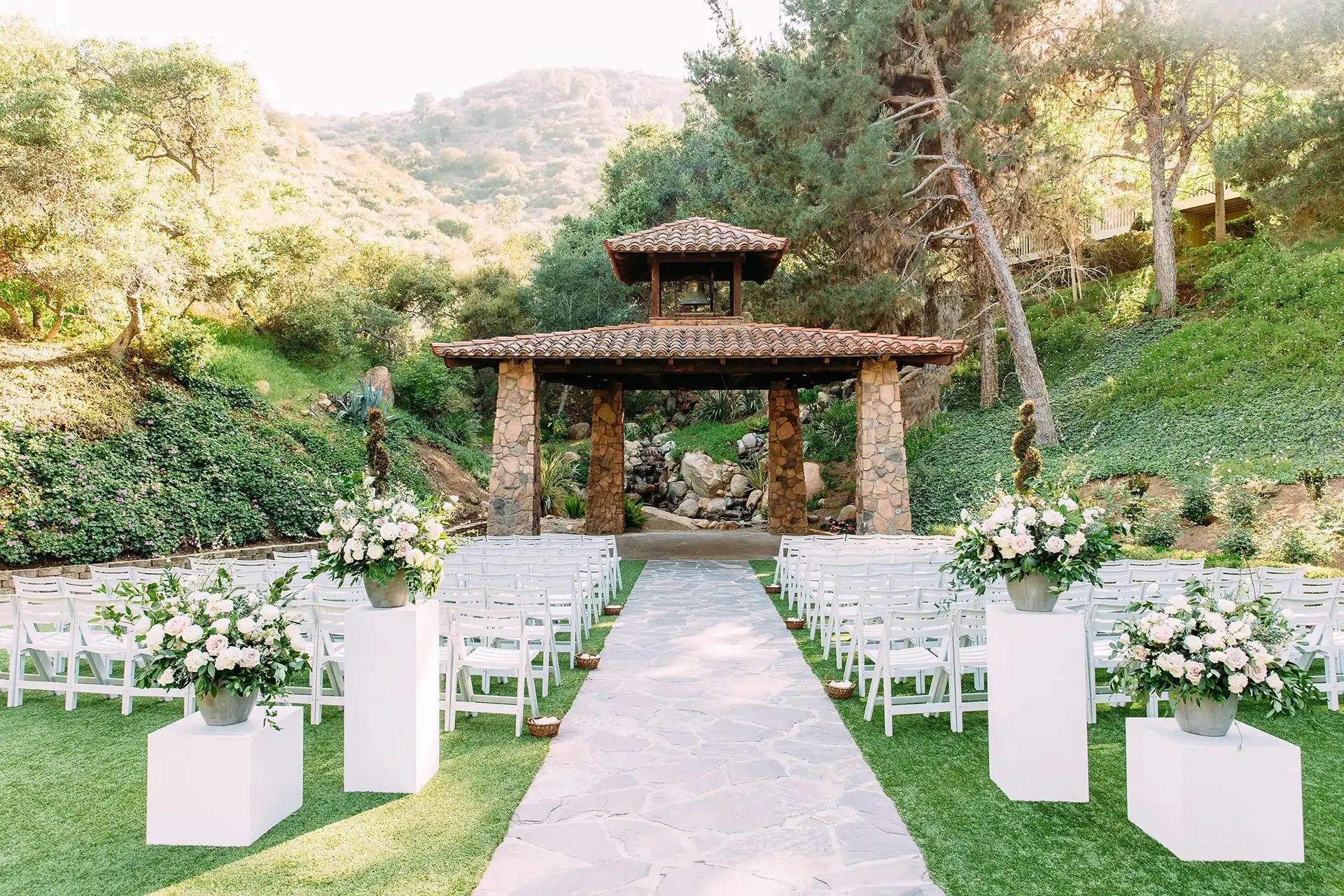 An outdoor wedding ceremony set up at Pala Mesa Resort